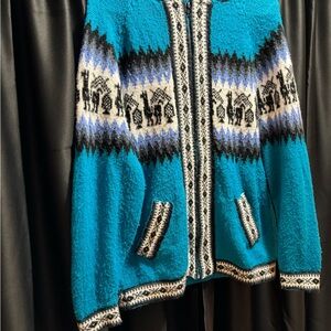 Peruvian Blue and Black Patterned Knit Cardigan. Full zipper and hood.